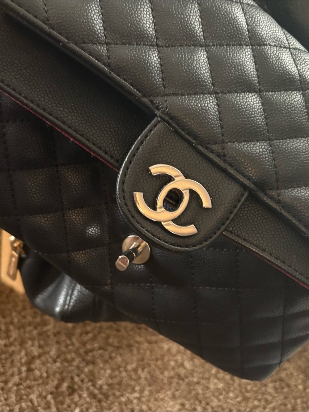 CHANEL Black Quilted Leather Shoulder Bag with Silver CC Lock